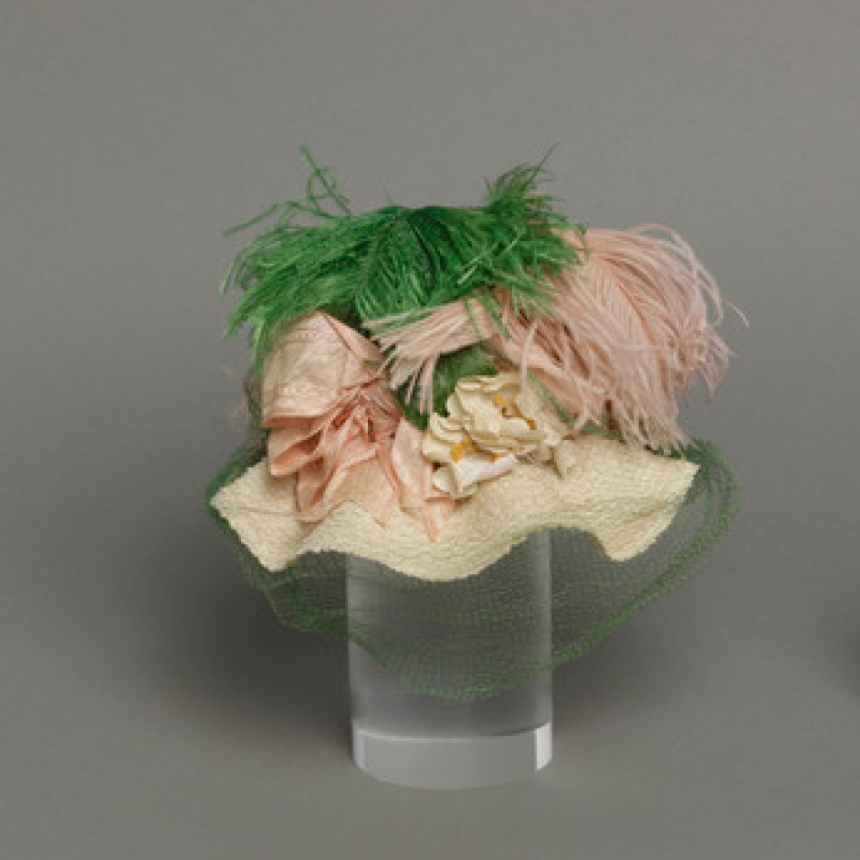 Mildred Blount miniature period hat; straw, braided, with silk plain weave (moiré) with silk supplementary warp patterning and ostrich feathers; 4 × 7 × 5 3/4 in. (10.16 × 17.78 × 14.61 cm); Gift of Marjorie St. Cyr (CR.75.2.27); courtesy of LACMA collections