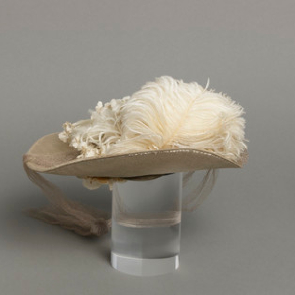Mildred Blount miniature period hat; Silk velvet with silk plain weave, linen plain weave (buckrum), ostrich feather, and silk net; 2 1/2 × 8 3/4 × 8 3/4 in. (6.35 × 22.23 × 22.23 cm); Gift of Marjorie St. Cyr (CR.75.2.26); courtesy of LACMA collections